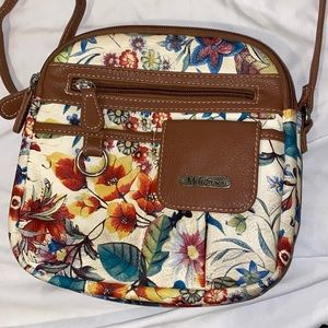 Floral cross body bag.